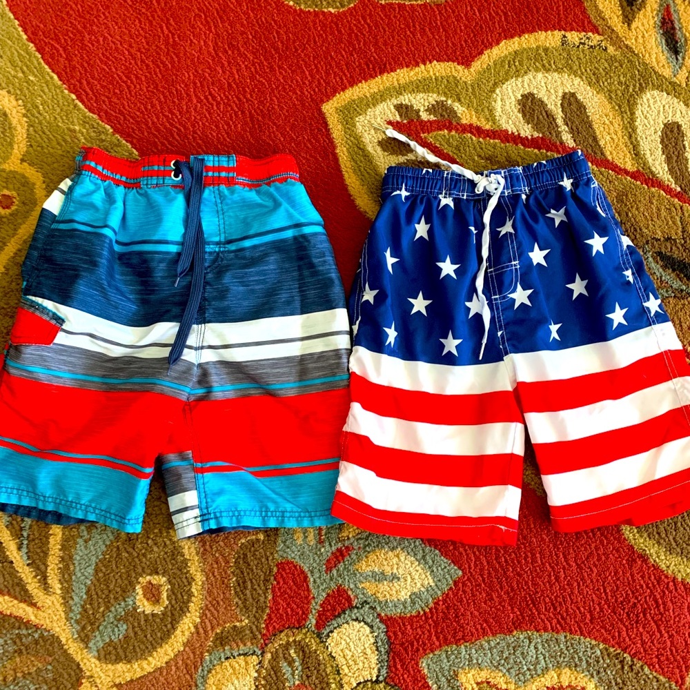 Two pairs of boys swimming trunks. Both size 14-16.